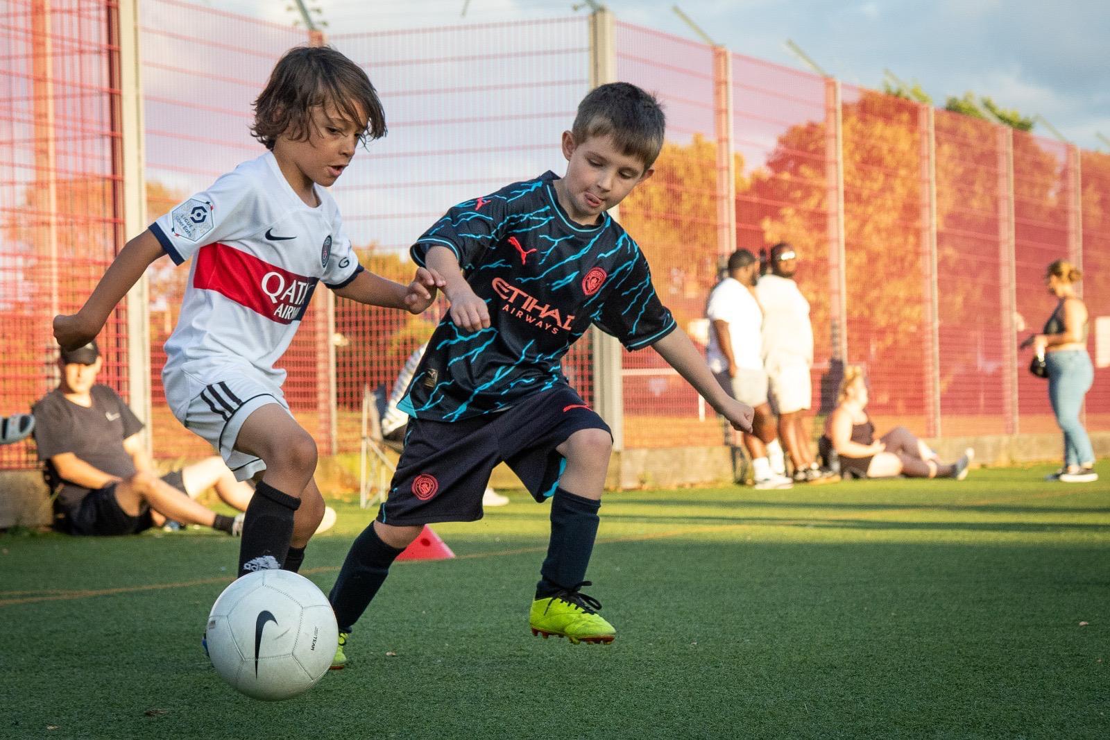 Xander shielding the ball from an opponent during a match